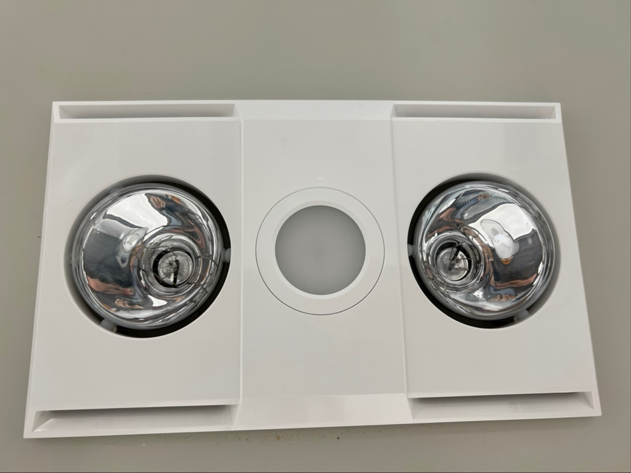 Bathroom heat lamp and exhaust unit, freshly fitted
